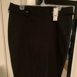 Black A-Line skirt w/ belt. Stretch fabric